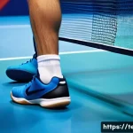 탁구 신발 브랜드별 리뷰 - A dynamic, close-up shot of a male table tennis player's feet mid-action on a vibrant blue court, sh...